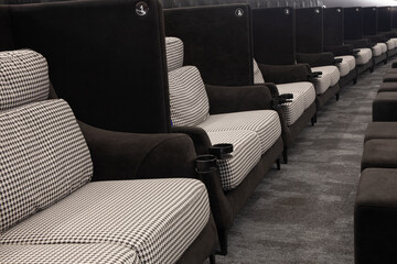 Soft fabric light double seats in row at movie theater - great entertainment fun background image