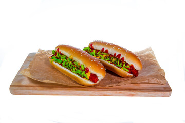 Two fresh hot dogs isolated