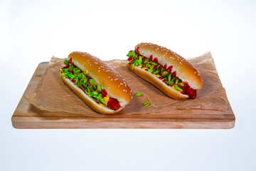 Two fresh hot dogs isolated