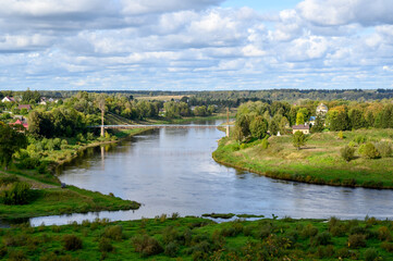 Fototapeta na wymiar View of the Volga river and suspension bridge, Zubtsov, Tver region, Russian Federation, September 19, 2020