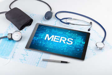 Close-up view of a tablet pc with medical abbreviation