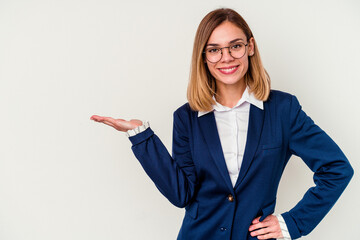 Young business caucasian woman isolated on white background showing a copy space on a palm and...