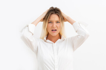 Beautiful young stressed businesswoman with white background.