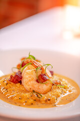 shrimp and grits served at a fine dining restaurant