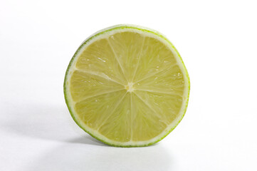 Green lime slice with white background