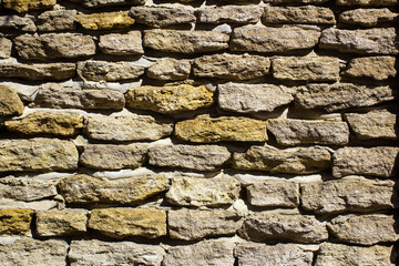 Obraz premium Rough stone masonry texture