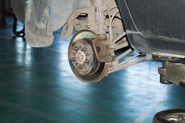 View of the brake mechanism of the rear right wheel of the car