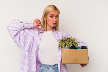 Young venezuelan woman making a move isolated on white background feels proud and self confident, example to follow.