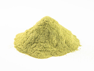 Fototapeta na wymiar Green powder from dried fruits, vegetables, and herbs