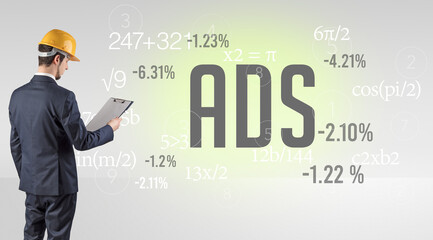 Engineer in hard hat with abbreviation