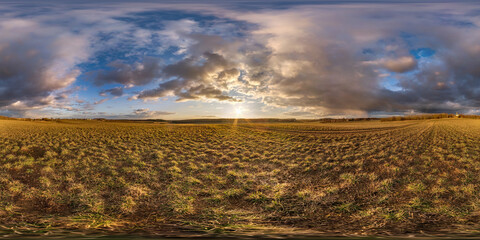 full spherical hdri panorama 360 degrees angle view on among farming fields in autumn evening with...