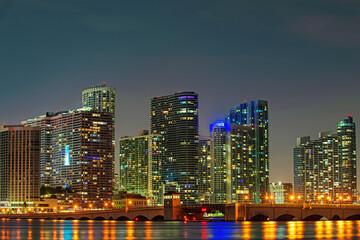 Obraz na płótnie Canvas Miami night downtown. City of Miami, night panorama of downtown business skyscrapers.