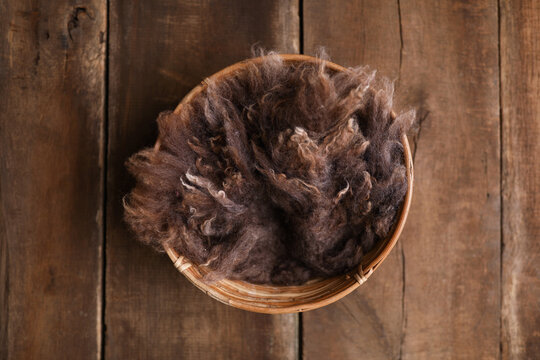Newborn photography digital background prop. Wood basket with fur and on a wooden background