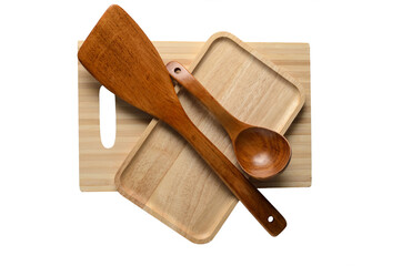 Wooden eco-friendly tableware. Wooden plate, spoon, cutting board, spatula.