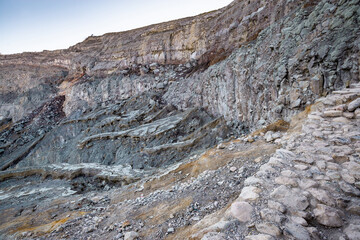 Rock wall and sulphur mining in Ijen crater in the morning in Kawah Ijen volcano Landmark from East Java Indonesia