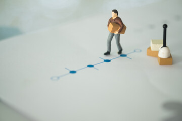 Miniature people with parcel go to sent. Transportation logistic