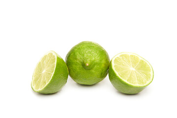 Fresh and sliced lime isolated on white background