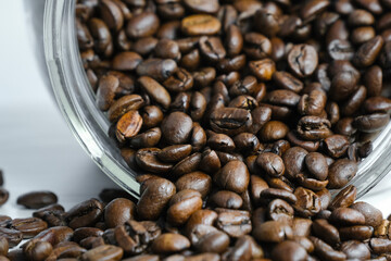 close-up of roasted coffee beans ready for grinding and preparing a delicious drink