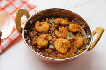 Indian food- Prawns masala or shrimp curry. Also known as Kolambi che Kalvan in Marathi. Chingri fry. Maharashtrian Prawns curry. Copy space.
