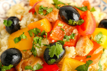 Tasty couscous with vegetables as background