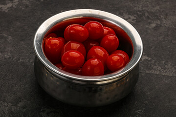Pickled cherry tomatoes in the bowl