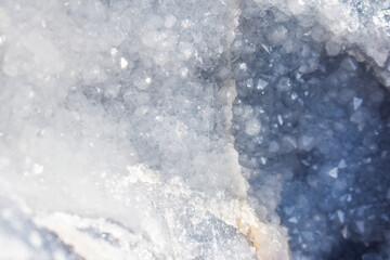 Crystal mineral stone cluster background. Extreme close up macro shot of geode geological crystals.
