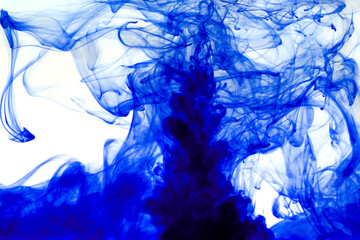 Abstract background picture with blue ink dissolving in water