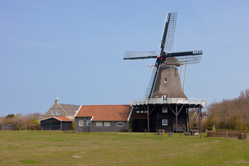 Fototapeta na wymiar Island of Ameland (Friesland/Fryslan, The Netherlands): Koren- and mosterdmolen De Verwachting / Wheat and Mosterd Mill Expectation