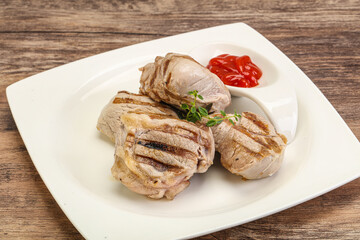 Grilled pork tenderlion with tomato sauce