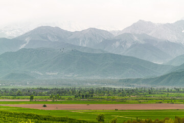 Fototapeta na wymiar A village at the foot of the Caucasian mountain range