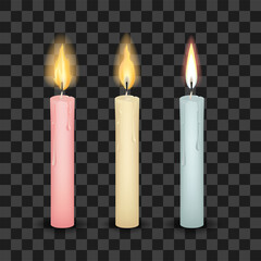 Set of three burning tall candles