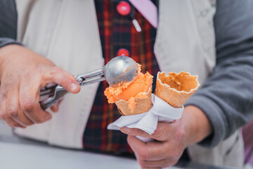 Latin woman hands preparing an ice cream