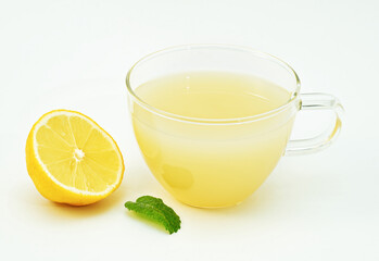 Lemon juice, lemon and mint, healthy and nutritious, white background