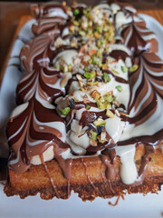 waffle with chocolate with nuts and pistachio