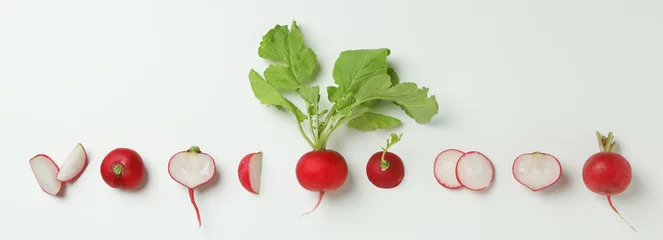 Fotobehang Flat lay with radish on white background, top view © Atlas