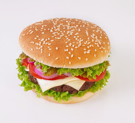 Close-up of a steak hamburger with cheese, white background