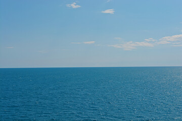 blue sky and sea with clouds