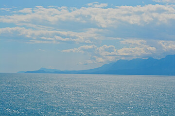 blue sky with clouds with mountains