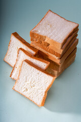 Toast bread slices stacked into towers