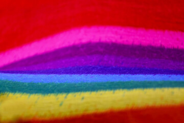 Rainbow cotton textile background stock images. Colorful fabric rainbow background stock photo. Multicolored bright background stock images. Abstract striped rainbow wallpaper