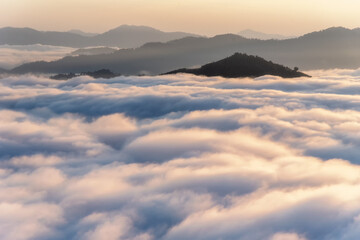 Beautiful view of sea of mist with mountains.