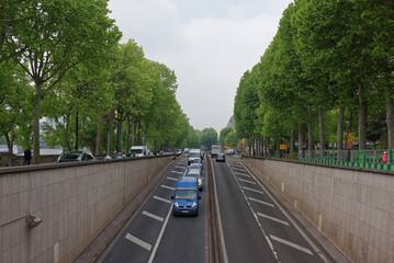 View of Avenue New York.There are cars on the avenue. Around the walk tourists