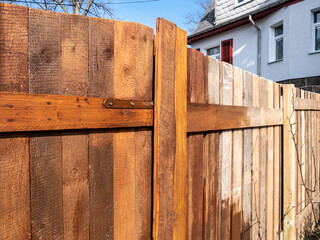 The garden fence is being repainted