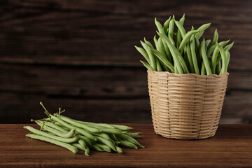 Fresh French beans isolated on wooden background, Needle beans, Green beans