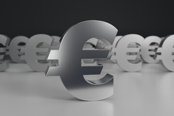 3D rendering of dominant European euro symbol in front of other same symbols