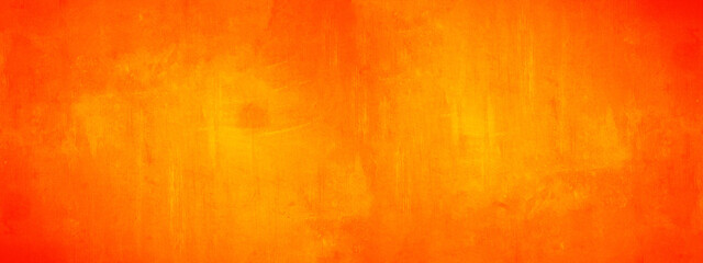 Dark orange yellow autumn colored painted abstract stone concrete paper texture background panorama...