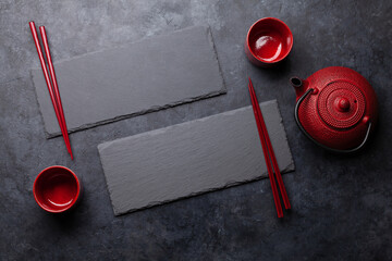 Stone plates and chopsticks for your sushi and maki © evgeeenius