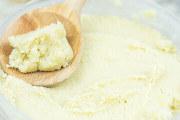Shea butter on light background, unrefined, close up