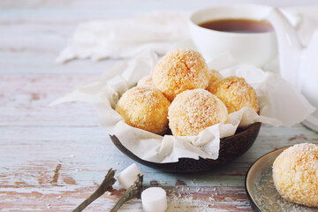 Coconut flakes cookies and cup of tea