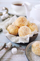 Coconut flakes cookies and cup of tea